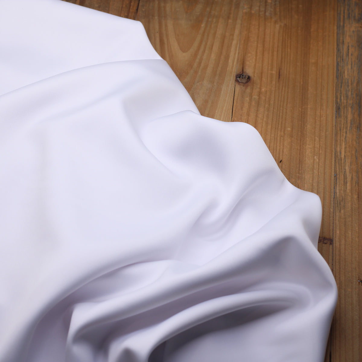 Tissu satin Duchesse uni - Blanc (Vendu x10cm)
