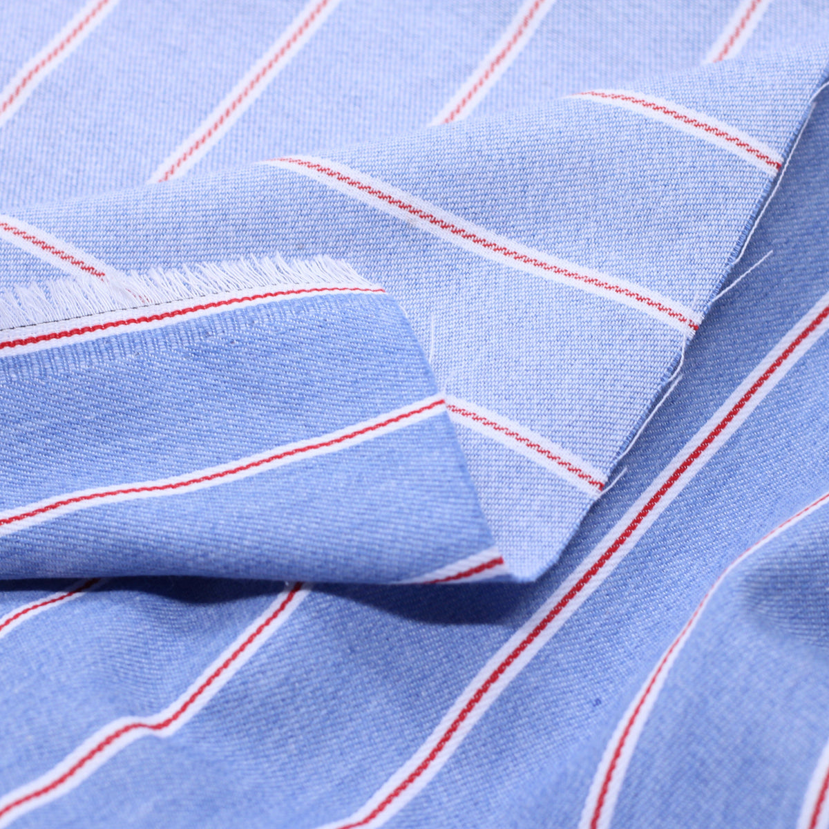 Tissu Coton Denim - Rayé - Bleu clair/Rouge (Vendu x10cm) Tissus Sélection Gaspard & Léonie | Gaspard et Léonie Tissus en ligne et Mercerie à Toulouse