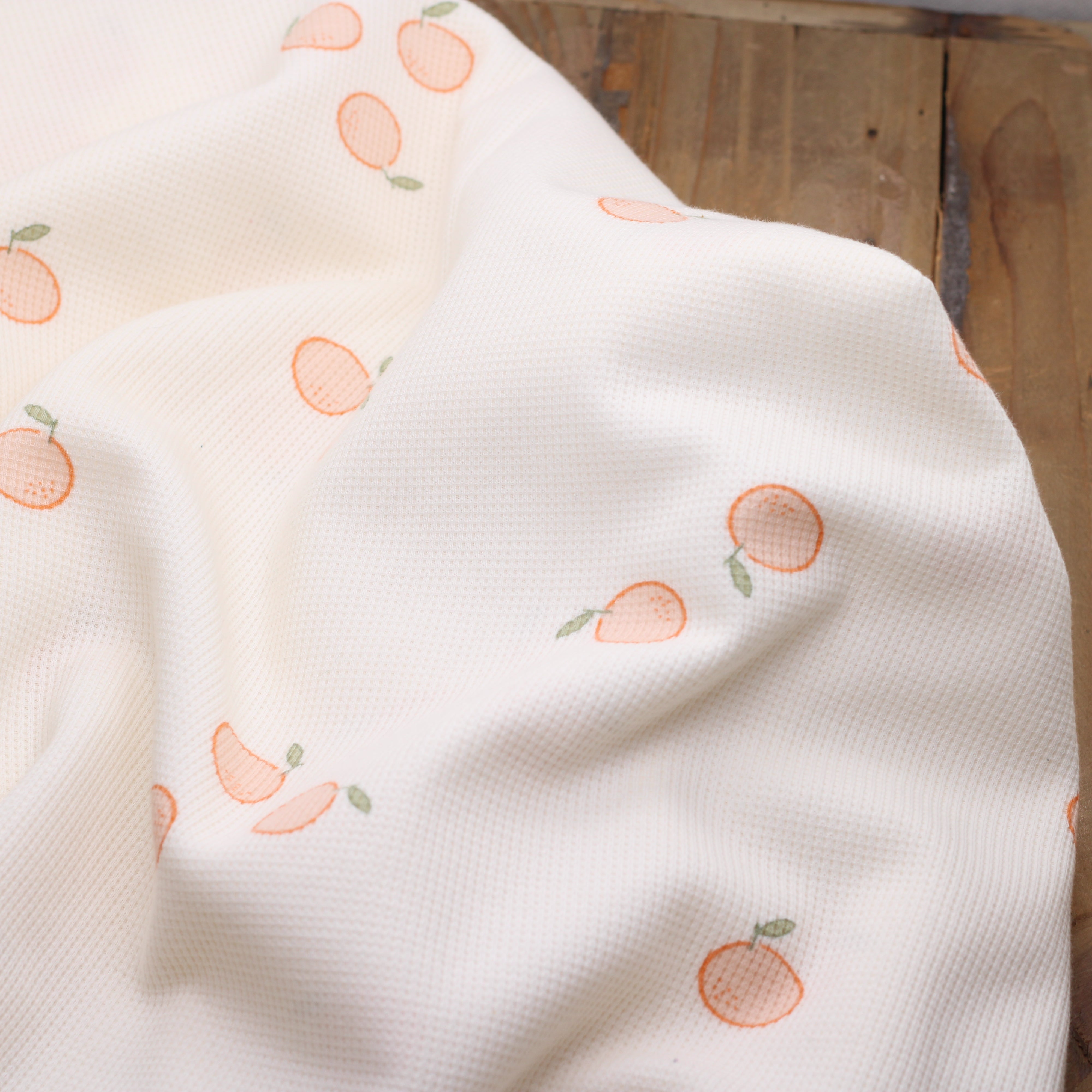 Tissu Jersey de coton gaufré- ORANGES - Ecru- POPPY DESIGNED (Vendu x10cm)