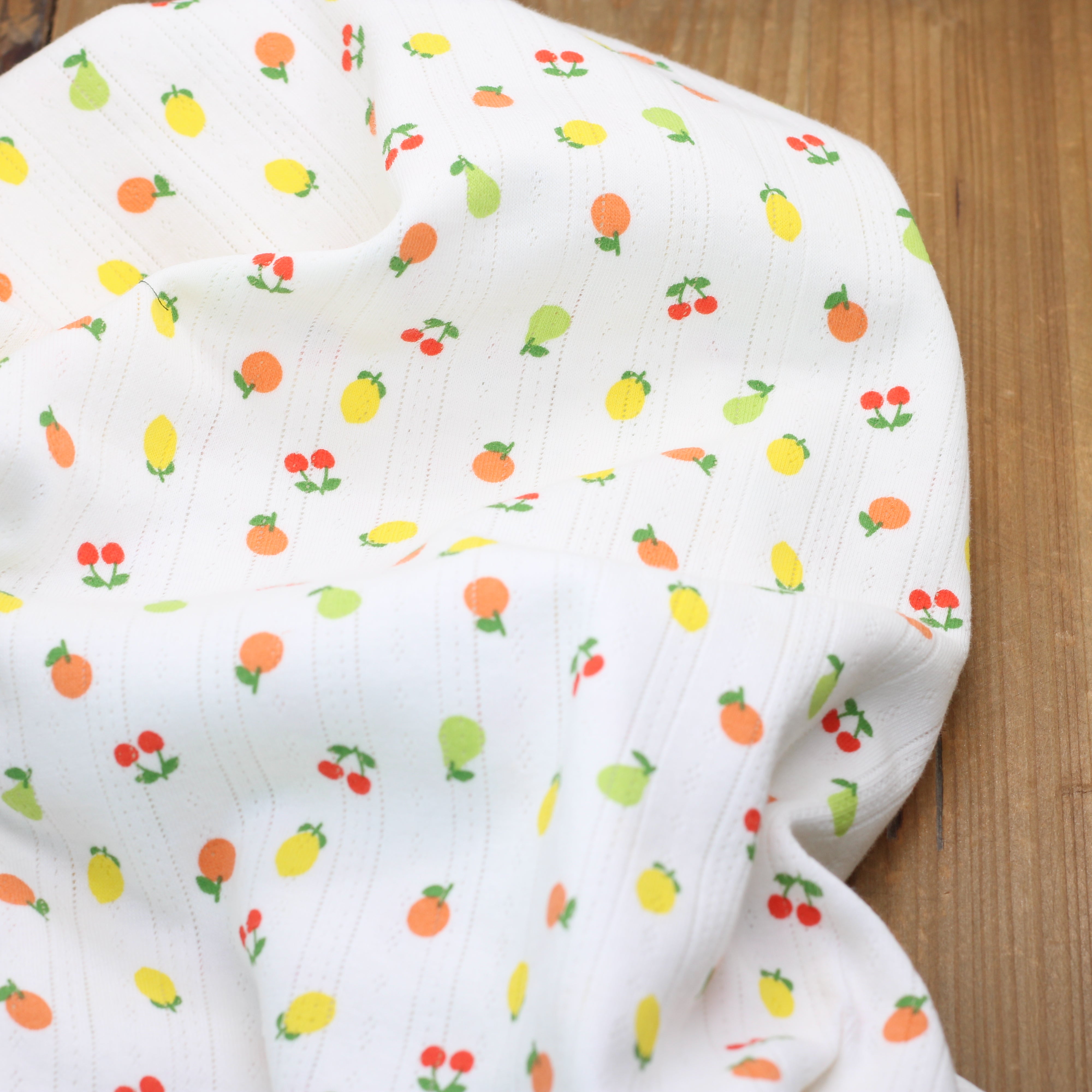 Tissu Jersey de coton Ajouré  - FRUITS - Blanc cassé (Vendu x10cm)