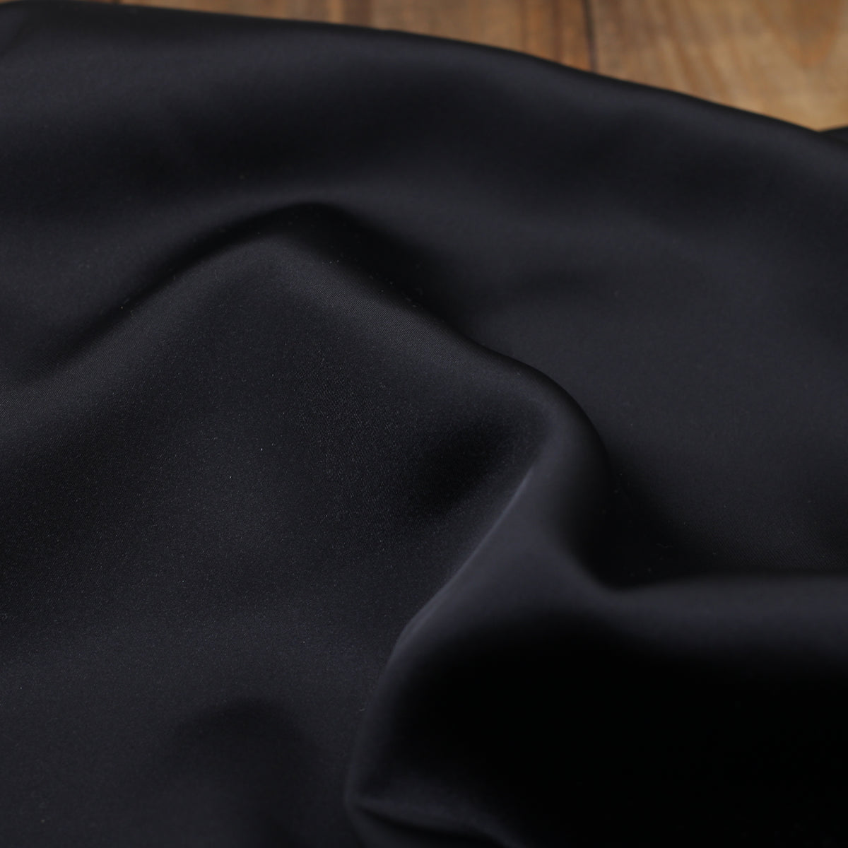 Tissu satin Duchesse uni - Noir (Vendu x10cm)