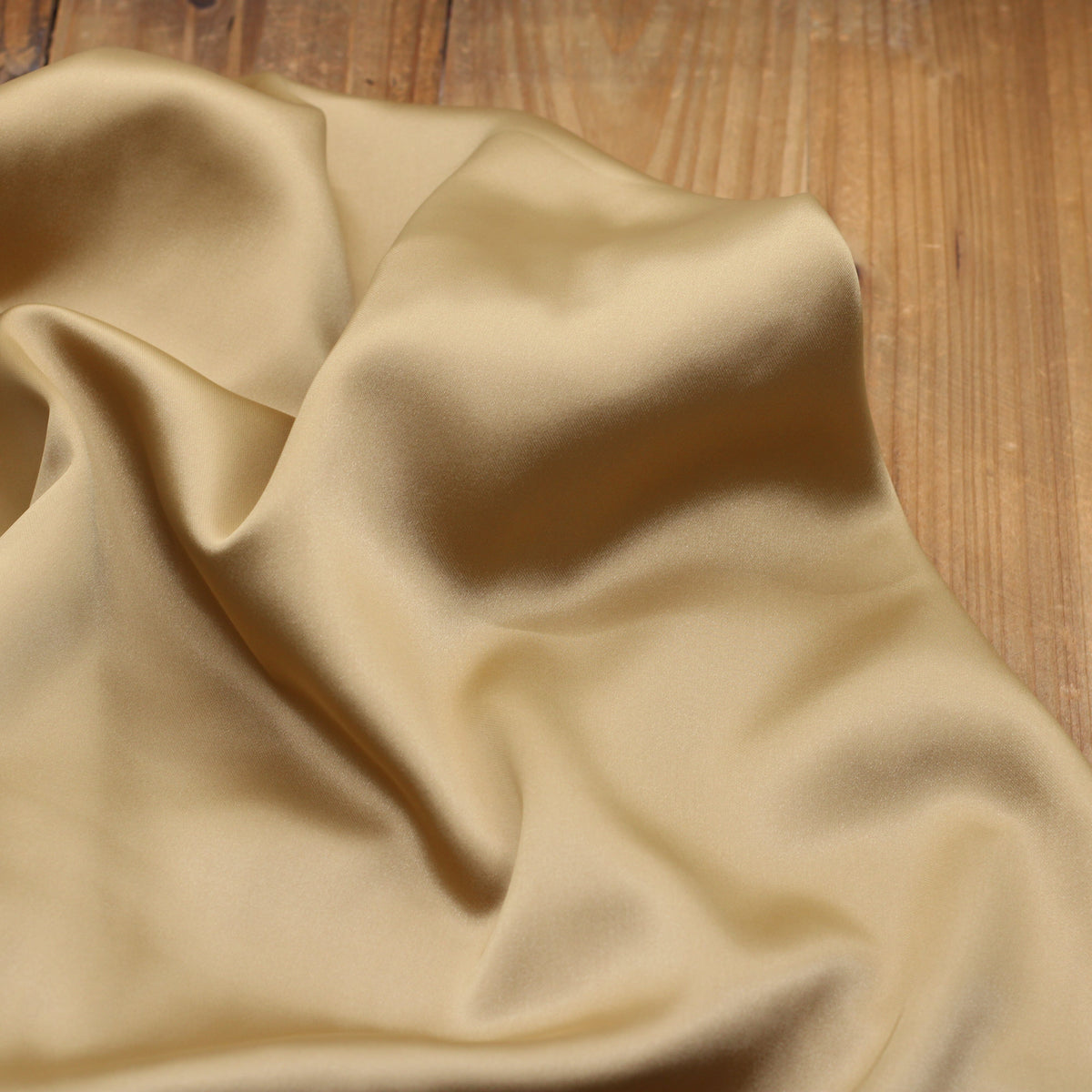 Tissu satin Duchesse uni - Bronze doré (Vendu x10cm) Tissus Sélection Gaspard & Léonie | Gaspard et Léonie Tissus en ligne et Mercerie à Toulouse