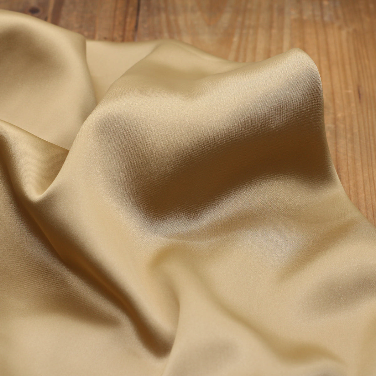Tissu satin Duchesse uni - Bronze doré (Vendu x10cm) Tissus Sélection Gaspard & Léonie | Gaspard et Léonie Tissus en ligne et Mercerie à Toulouse