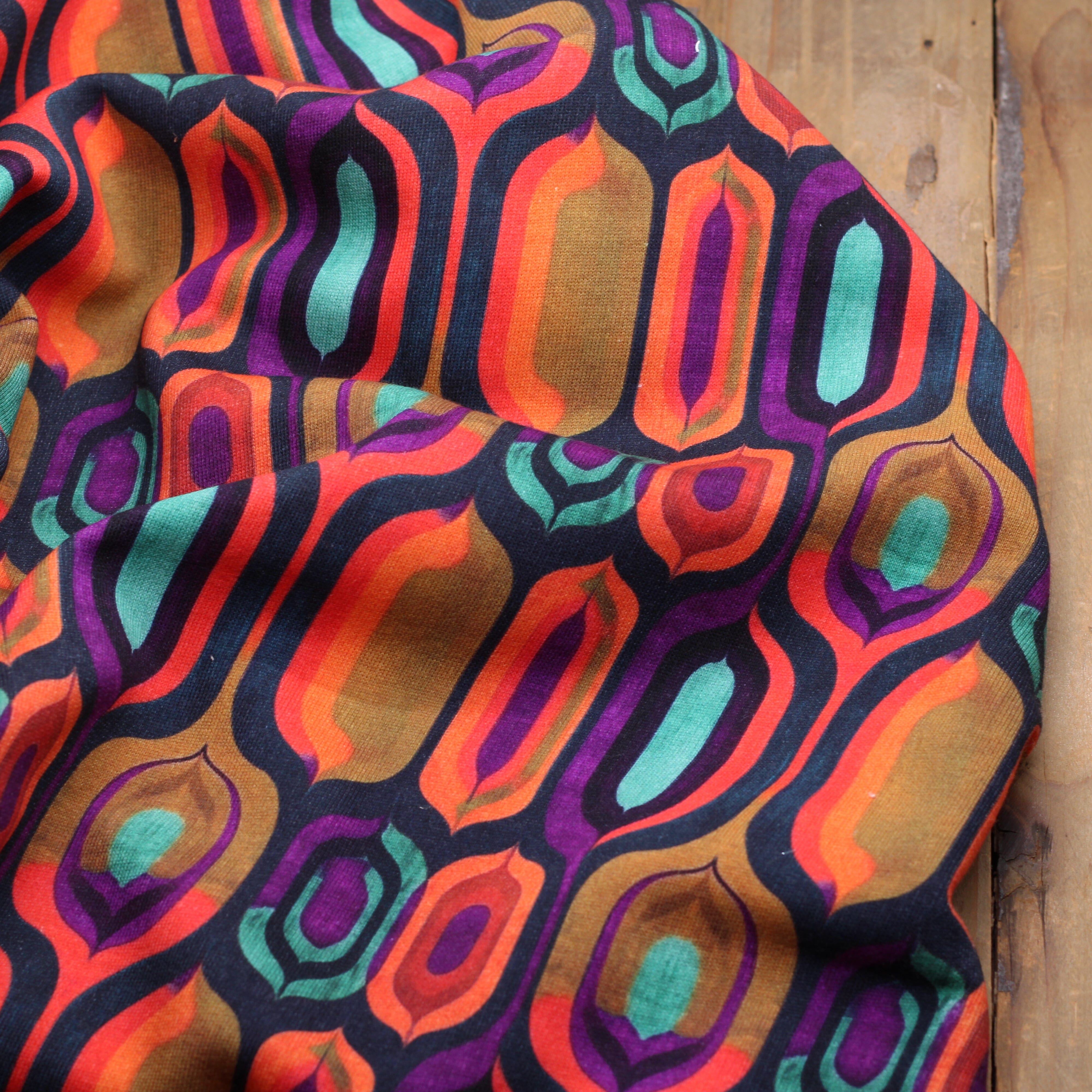 Tissu Sweat Jogging- VINTAGE PSYCHE - Orange/Violet - STENZO (Vendu x10cm) Tissus Stenzo | Gaspard et Léonie Tissus en ligne et Mercerie à Toulouse