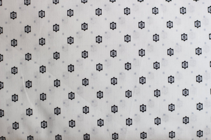 Tissu coton Popeline blanche à Motifs Noirs/Gris (Vendu x10cm) Tissus Sélection Gaspard & Léonie | Gaspard et Léonie Tissus Mercerie Toulouse