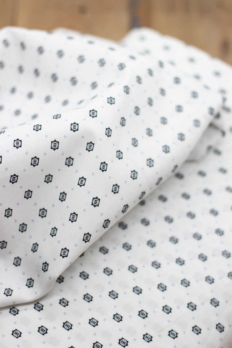 Tissu coton Popeline blanche à Motifs Noirs/Gris (Vendu x10cm) Tissus Sélection Gaspard & Léonie | Gaspard et Léonie Tissus Mercerie Toulouse