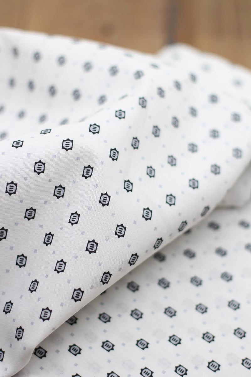 Tissu coton Popeline blanche à Motifs Noirs/Gris (Vendu x10cm) Tissus Sélection Gaspard & Léonie | Gaspard et Léonie Tissus Mercerie Toulouse