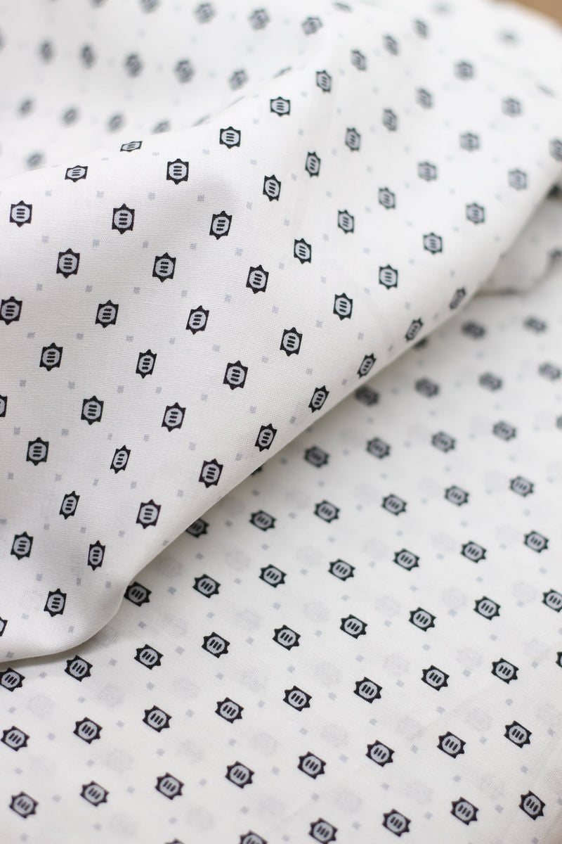Tissu coton Popeline blanche à Motifs Noirs/Gris (Vendu x10cm) Tissus Sélection Gaspard & Léonie | Gaspard et Léonie Tissus Mercerie Toulouse